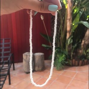 White bead necklace